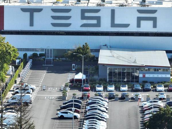 Tesla reports 443,956 deliveries in second quarter, a 4.8% decrease from last year