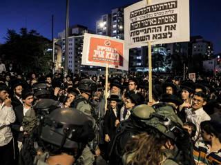 Ultra-Orthodox protest against order to enlist in Israeli military turns violent in Jerusalem