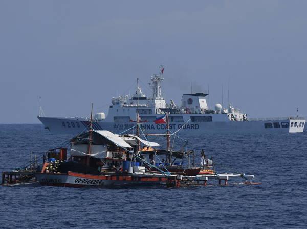 China and the Philippines hold crucial talks to ease tensions after intense clash in disputed waters